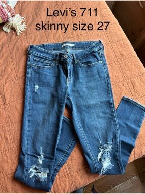 Levi's 711 Distressed Skinny Jeans in Blue Denim